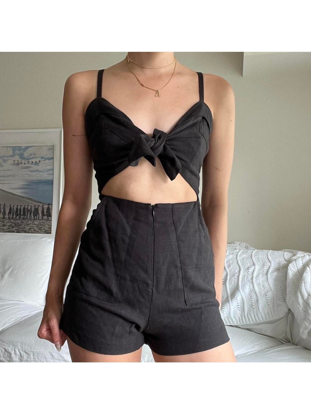 Black romper by reformation